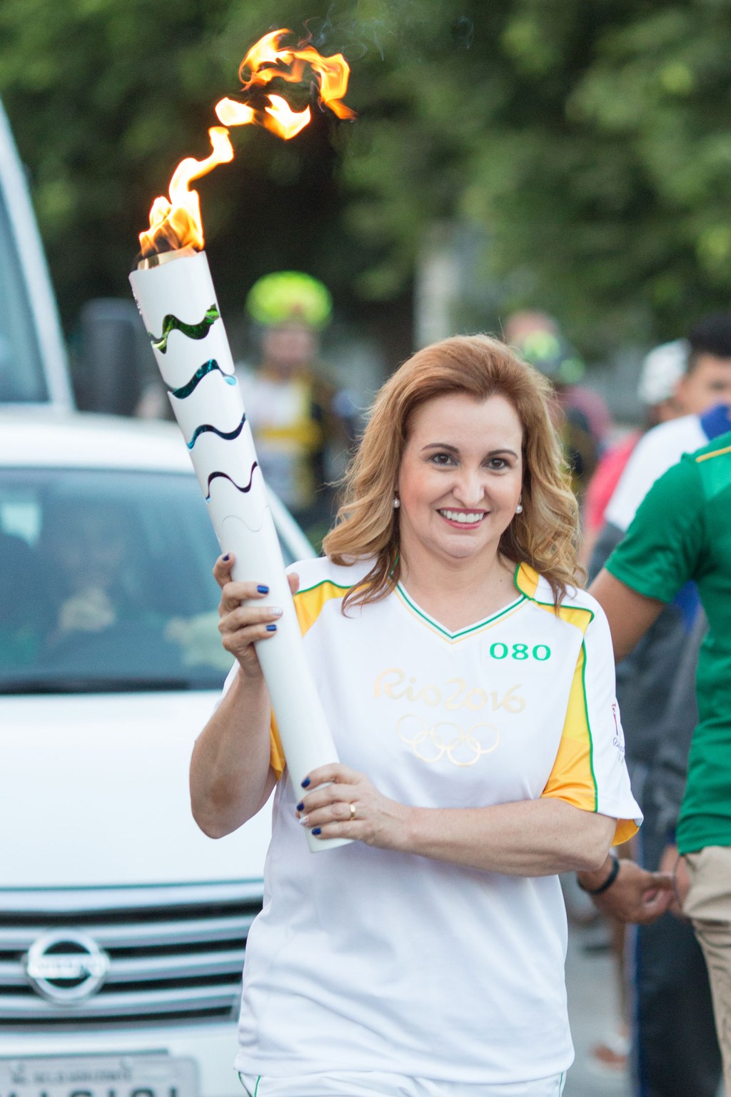 Profissional da CASA COR MT carrega tocha olímpica!